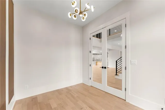 a kitchen with stainless steel appliances a sink a stove and a refrigerator