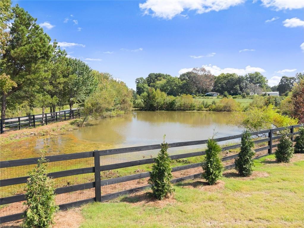2031 Jones Phillips Road Dacula, GA 30019 - Photo 85 of 89 a view of a lake with outdoor space
