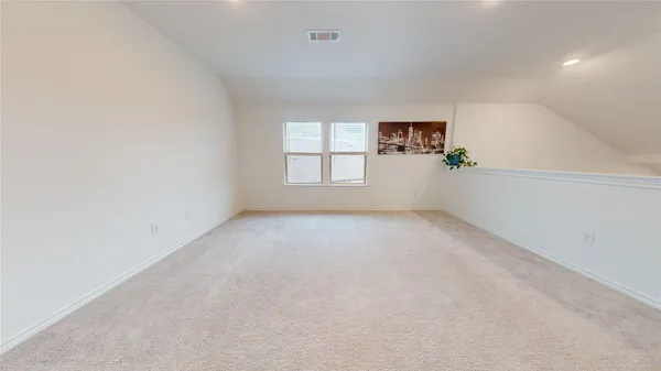 a children room with toys and a window