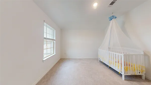 a view of living room with furniture and flat screen tv