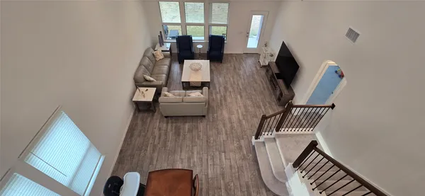 a view of yard with large trees