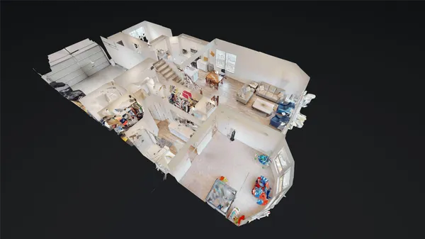 a view of a livingroom with furniture and front view