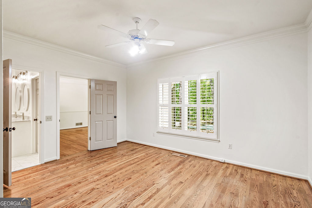 230 Haynes Road Moreland, GA 30259 - Photo 19 of 38 a view of an empty room with wooden floor and a window