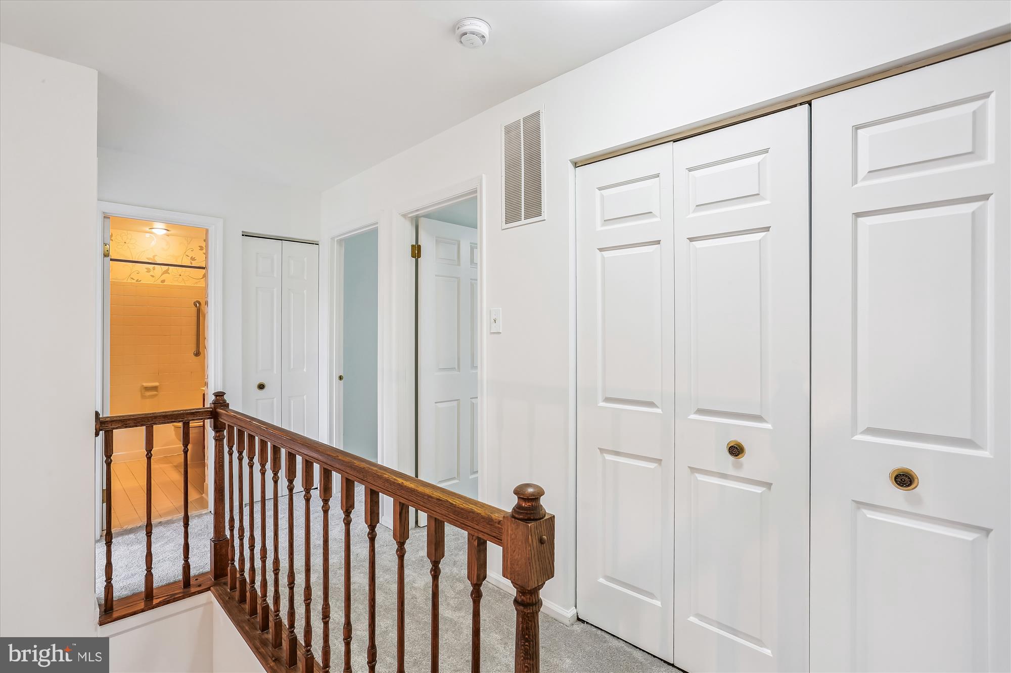 1944 Autumn Ridge Circle Silver Spring, MD 20906 - Photo 26 of 40 a view of a hallway with wooden floor and entryway