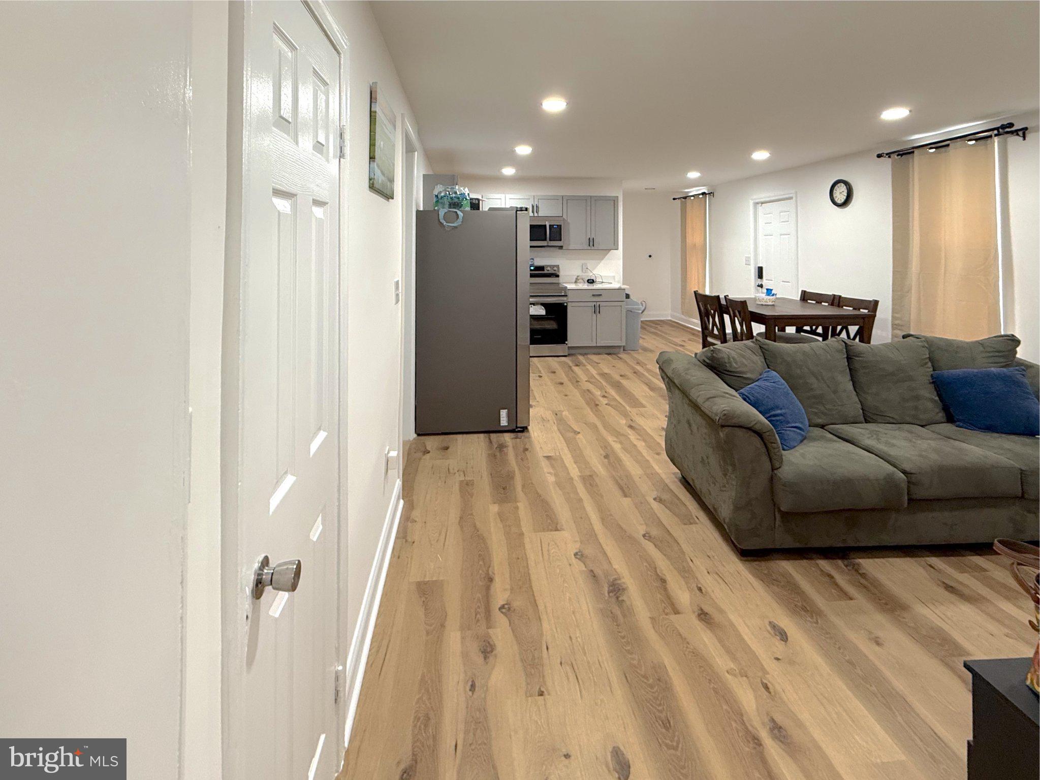 3703 6th Street, Unit 1 Baltimore, MD 21225 - Photo 3 of 12 Spacious modern living area awaits you.