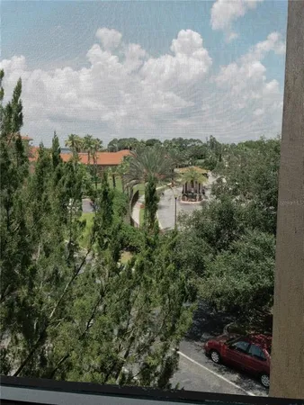 a view of a lake with lots of trees