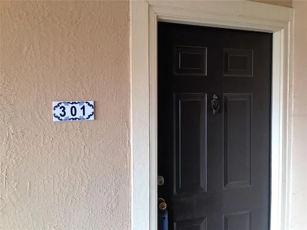 a wall with a painting on the wall