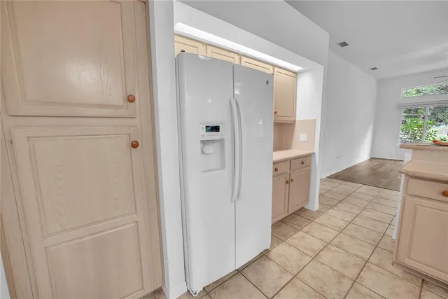 a bathroom with a shower and a mirror