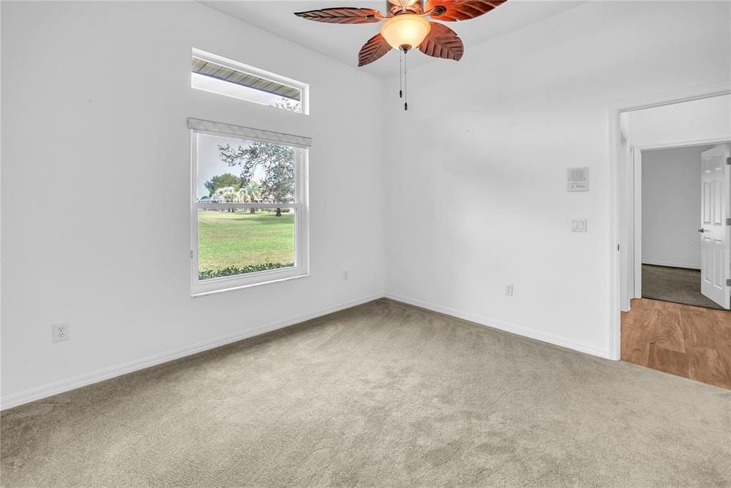 10317 Southwest 63rd Avenue Ocala, FL 34476 - Photo 27 of 46 an empty room with a window