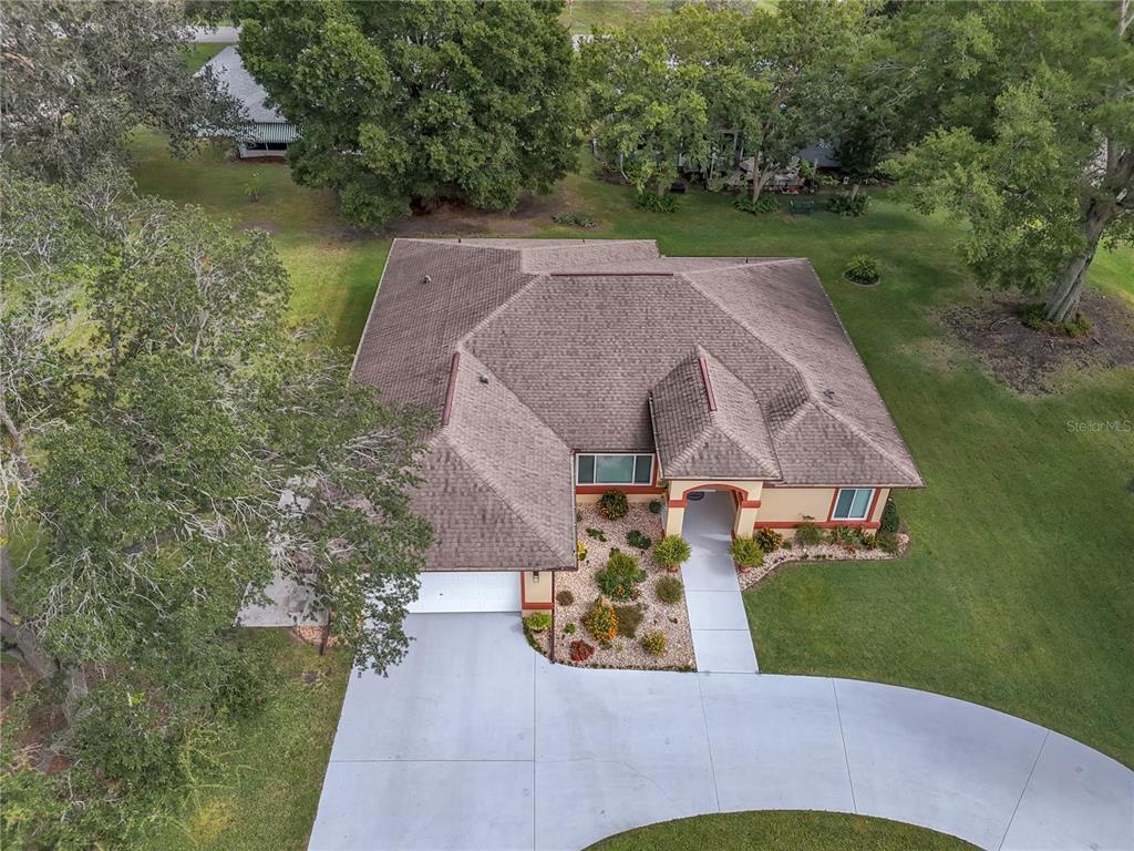 10317 Southwest 63rd Avenue Ocala, FL 34476 - Photo 43 of 46 an aerial view of a house with outdoor space and lake view