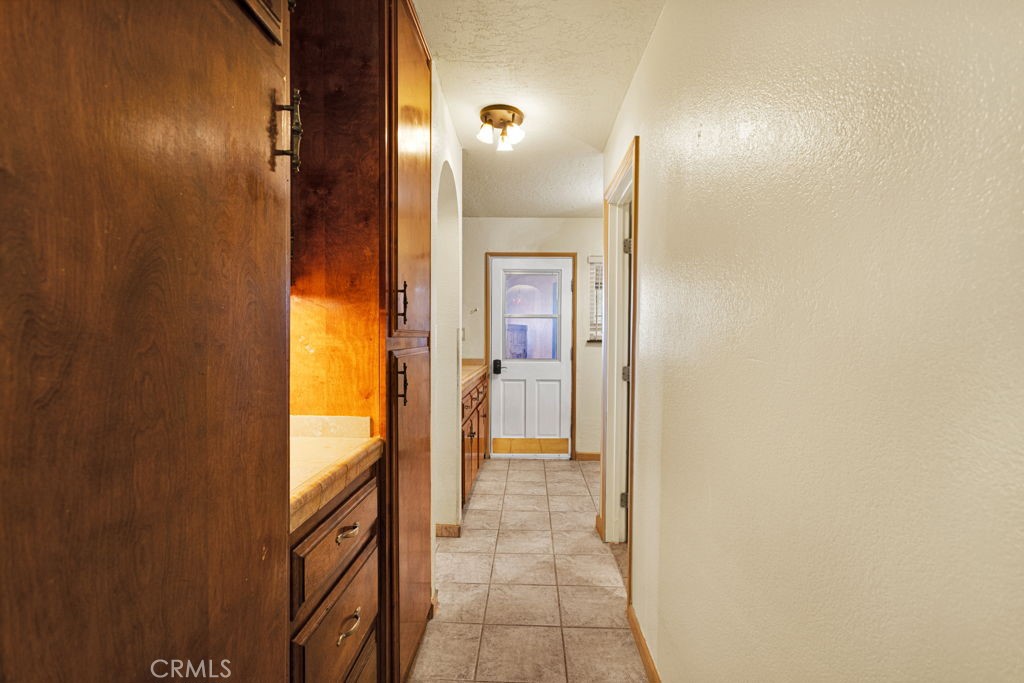 9072 Green Road Pinon Hills, CA 92372 - Photo 22 of 70 butler pantry, storage