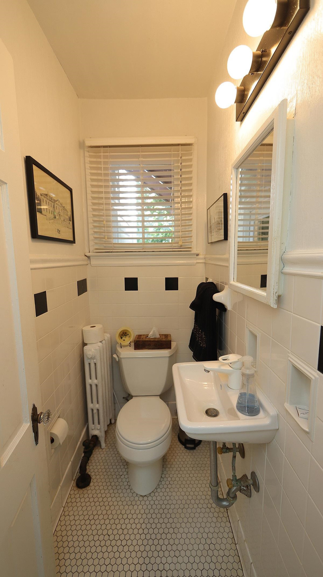 1608 Craig Street Raleigh, NC 27608 - Photo 21 of 42 1st floor full Bath with shower behind the door. Bath