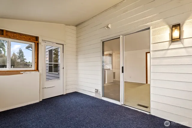 a view of an empty room with window