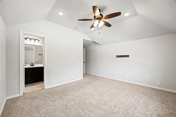 a view of a livingroom with a ceiling fan and a ceiling fan