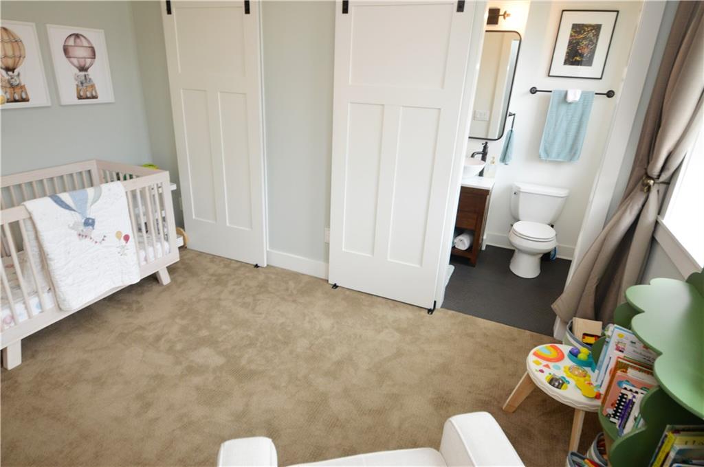 99 South 13th Street Pittsburgh, PA 15203 - Photo 35 of 50 a bathroom with a sink mirror toilet and next to a window