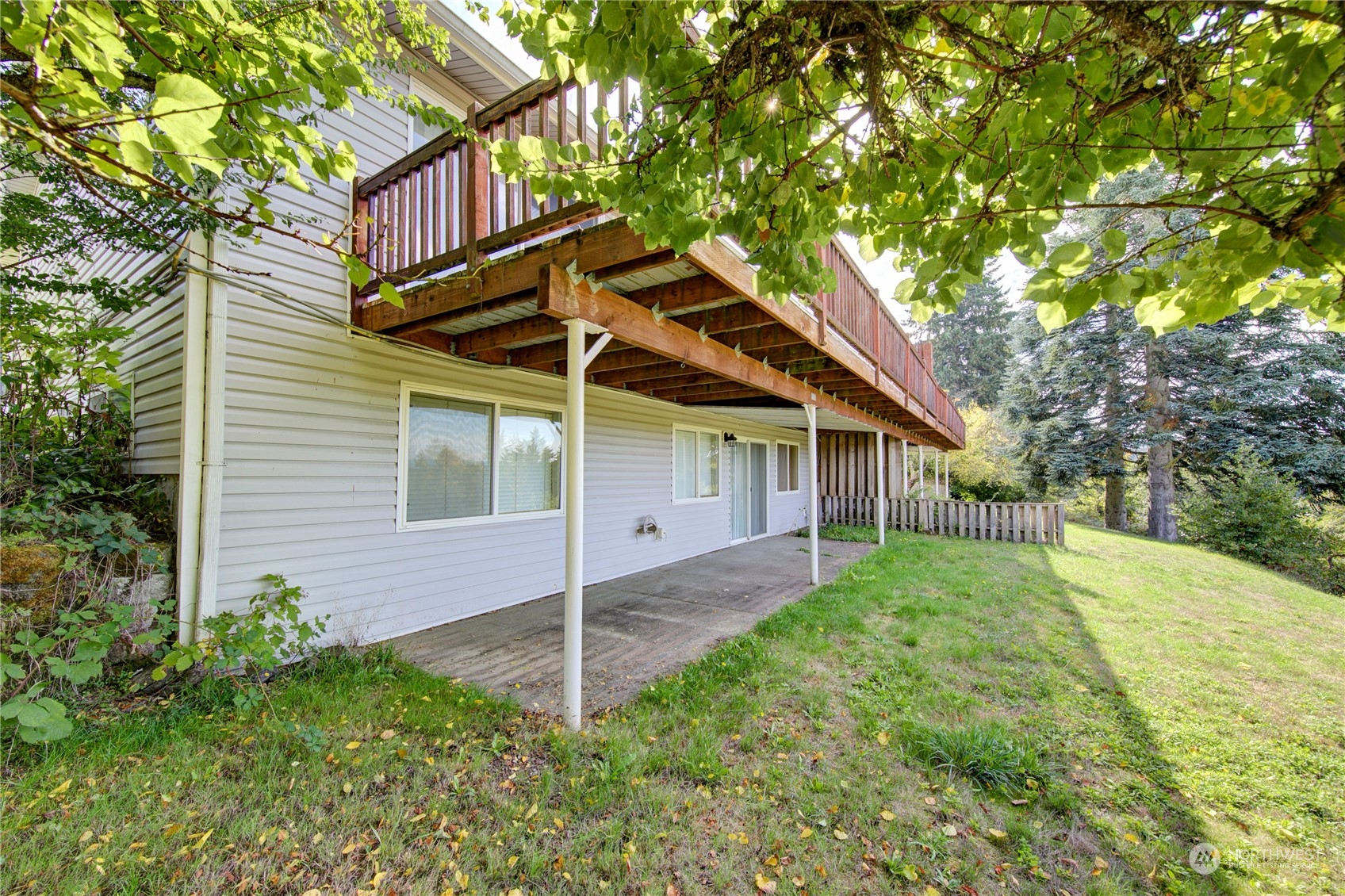 4751 Southeast Horstman Road Port Orchard, WA 98366 - Photo 27 of 40 a front view of house with yard and trees