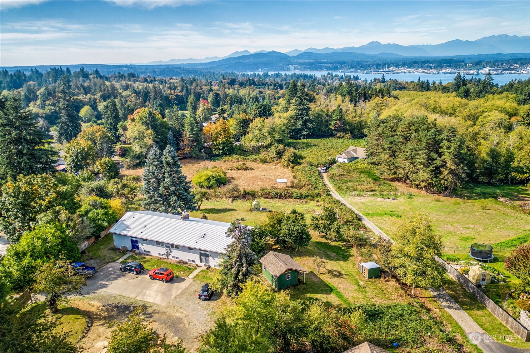 4751 Southeast Horstman Road Port Orchard, WA 98366 - Photo 28 of 40 an aerial view of residential houses with outdoor space