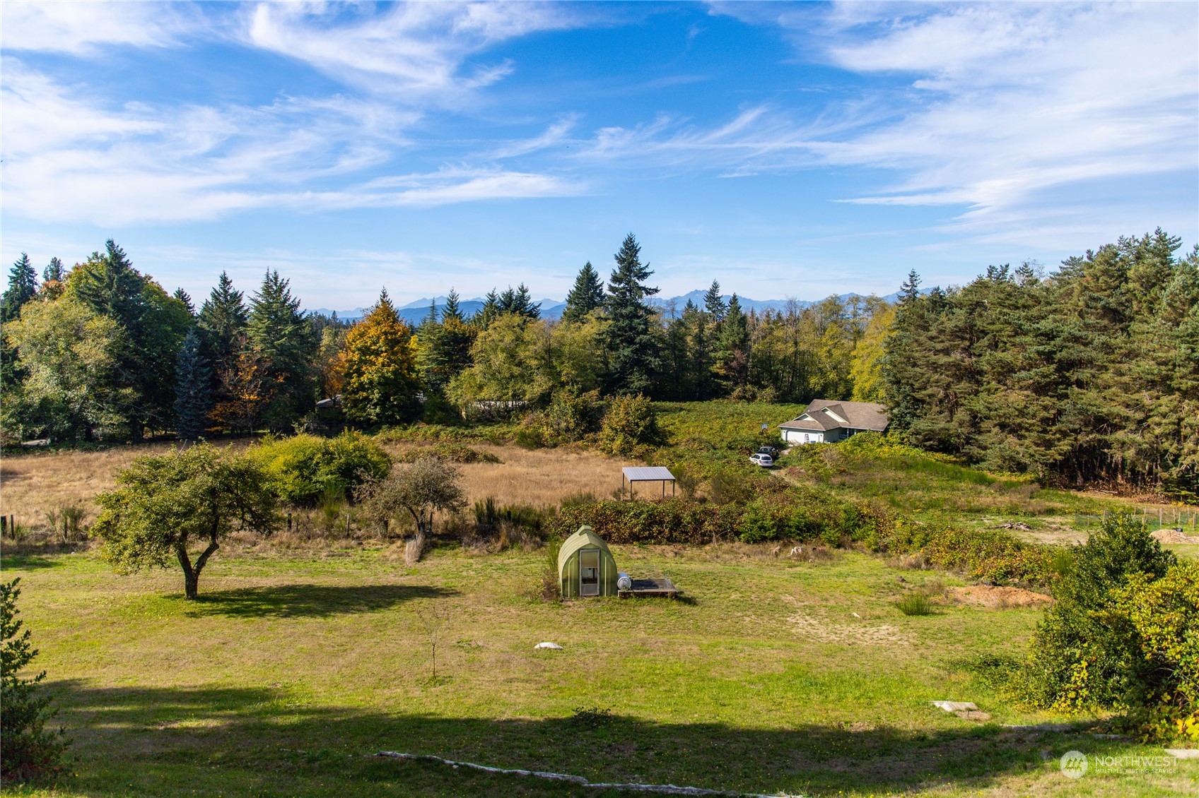 4751 Southeast Horstman Road Port Orchard, WA 98366 - Photo 29 of 40 a view of a lake with houses