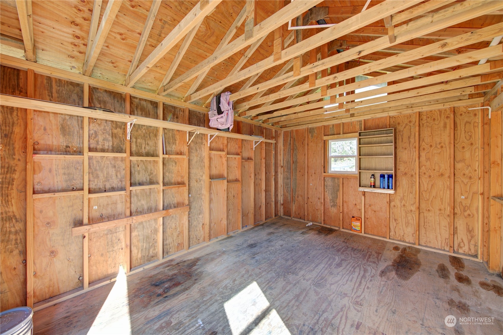 4751 Southeast Horstman Road Port Orchard, WA 98366 - Photo 32 of 40 an empty room with wooden floor and windows