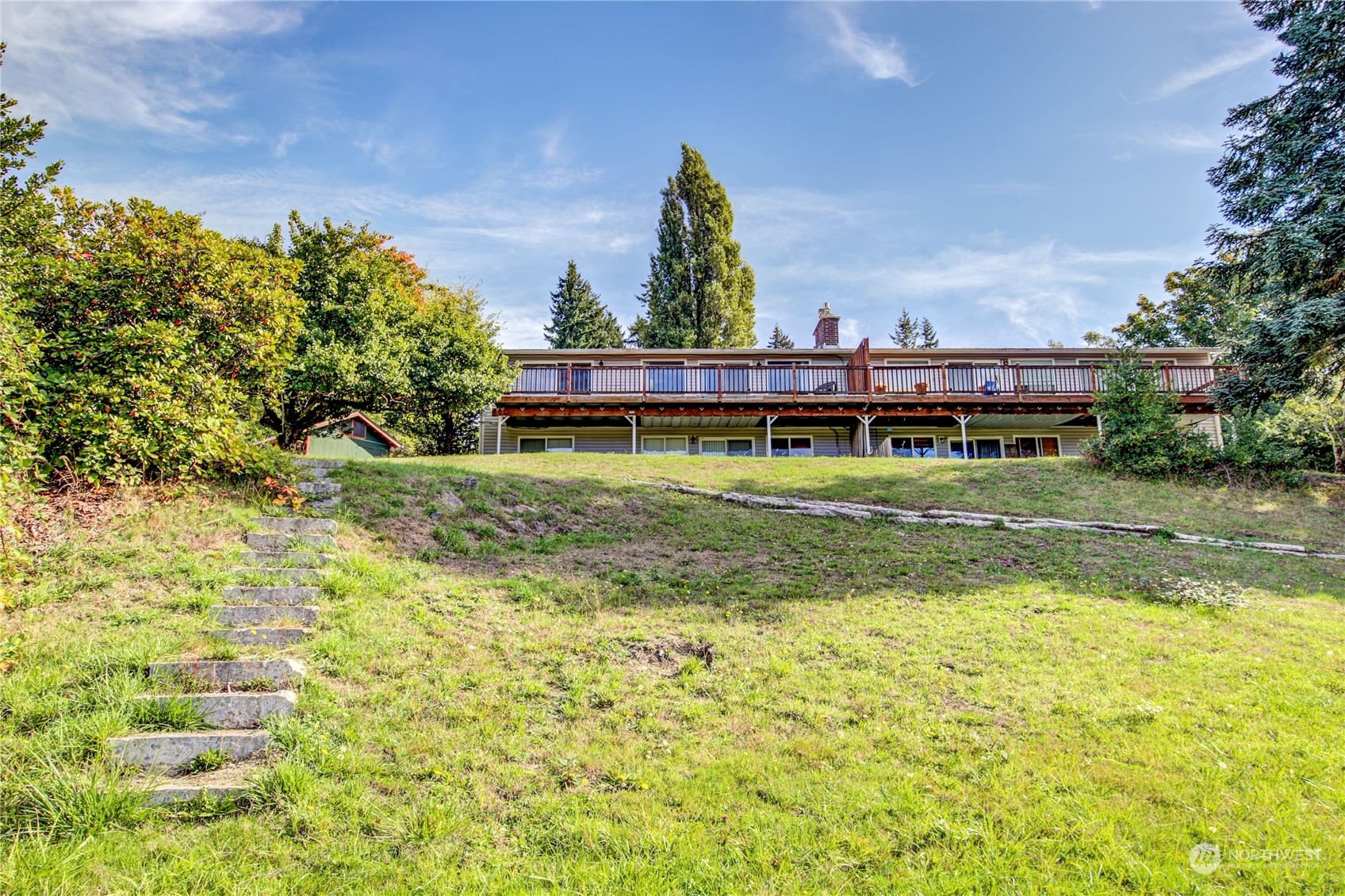 4751 Southeast Horstman Road Port Orchard, WA 98366 - Photo 38 of 40 a view of a house with a yard