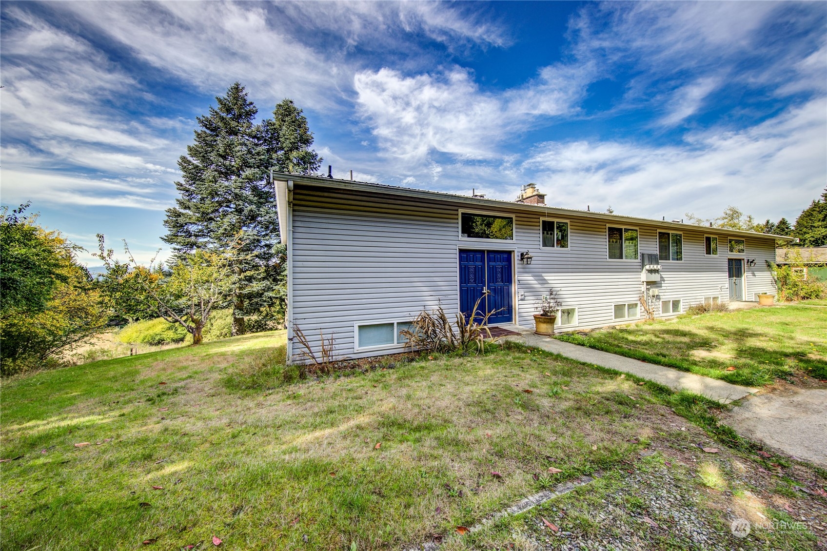 4751 Southeast Horstman Road Port Orchard, WA 98366 - Photo 5 of 40 a view of a backyard of the house