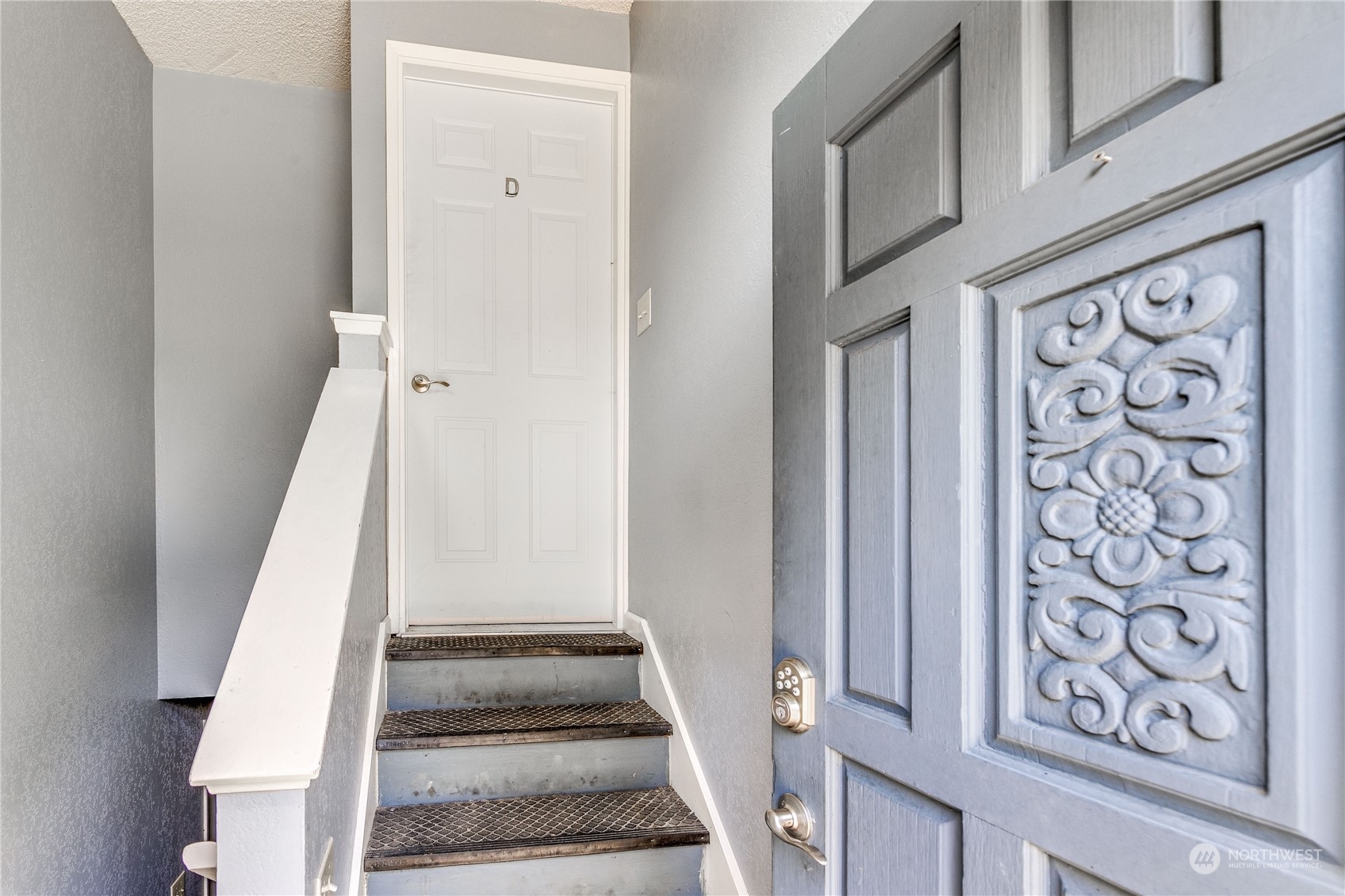 4751 Southeast Horstman Road Port Orchard, WA 98366 - Photo 7 of 40 a view of staircase with white walls