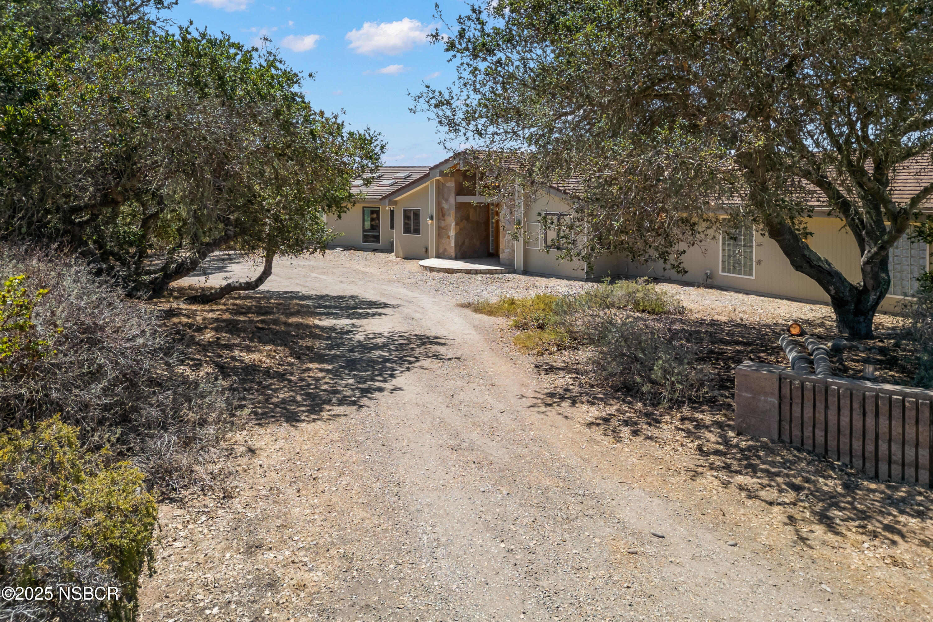 2775 Wild Oak Lompoc, CA 93436 - Photo 4 of 35 a front view of a house with a yard