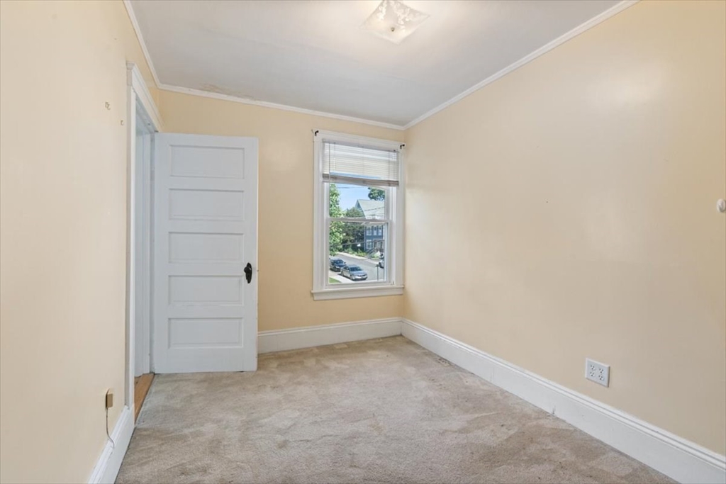 98 Webster Street Haverhill, MA 01830 - Photo 31 of 42 an empty room with windows