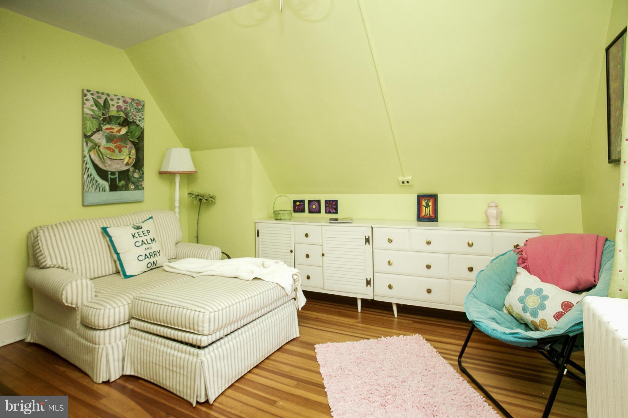214 Goodale Road Baltimore, MD 21212 - Photo 23 of 30 a bedroom with a bed and a couch