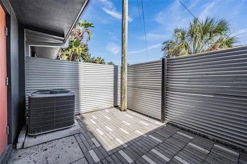 a view of a house with a barbeque