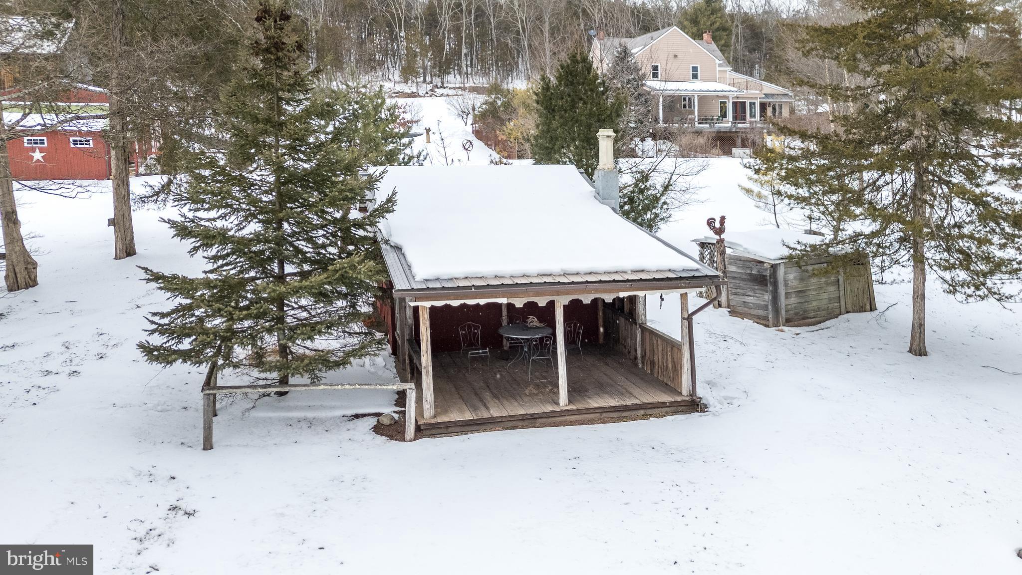 23 Lily Valley Road Erwinna, PA 18920 - Photo 12 of 81 a view of a house with a backyard and snow