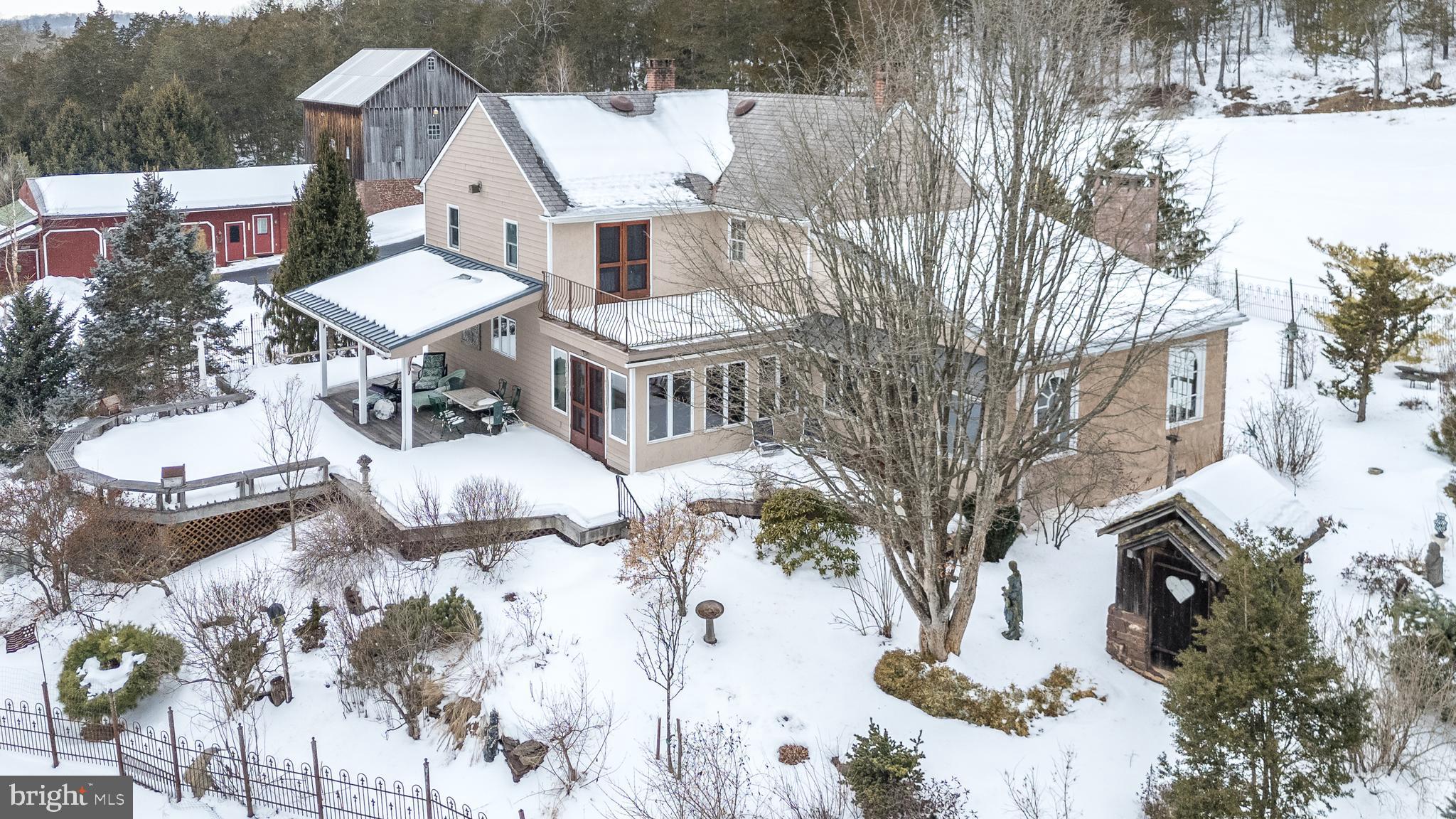 23 Lily Valley Road Erwinna, PA 18920 - Photo 17 of 81 a view of a house with a yard covered in snow