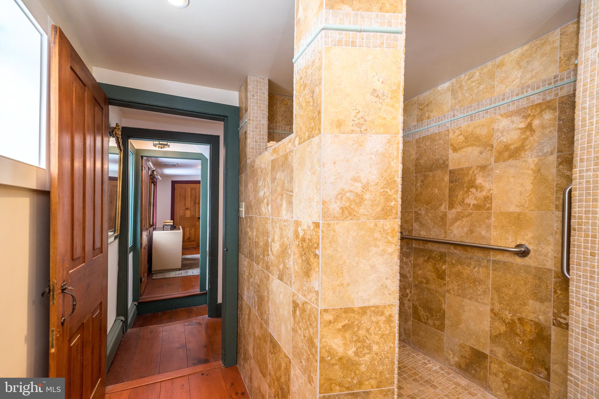 23 Lily Valley Road Erwinna, PA 18920 - Photo 28 of 81 a view of a bathroom with a glass door