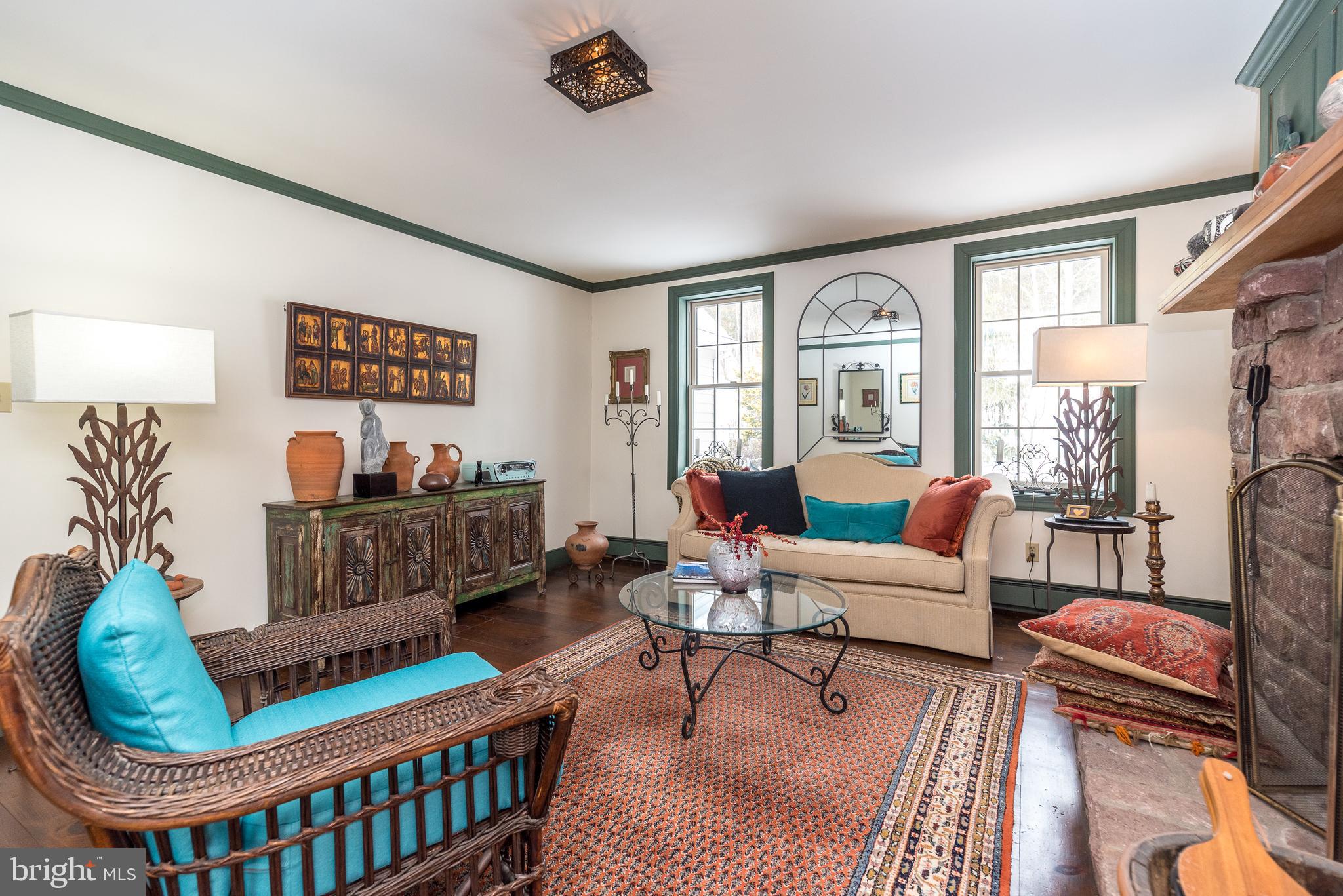 23 Lily Valley Road Erwinna, PA 18920 - Photo 35 of 81 a living room with furniture and a window
