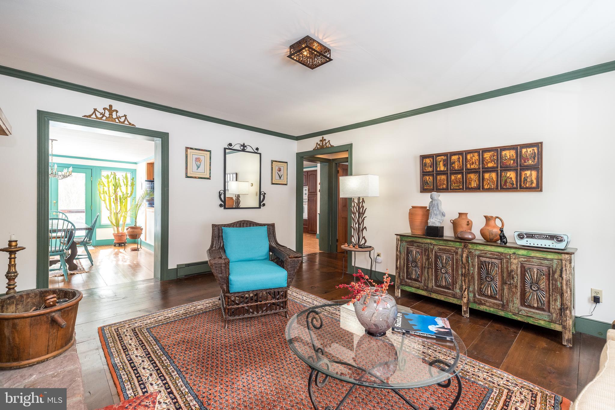 23 Lily Valley Road Erwinna, PA 18920 - Photo 37 of 81 a living room with furniture and wooden floor