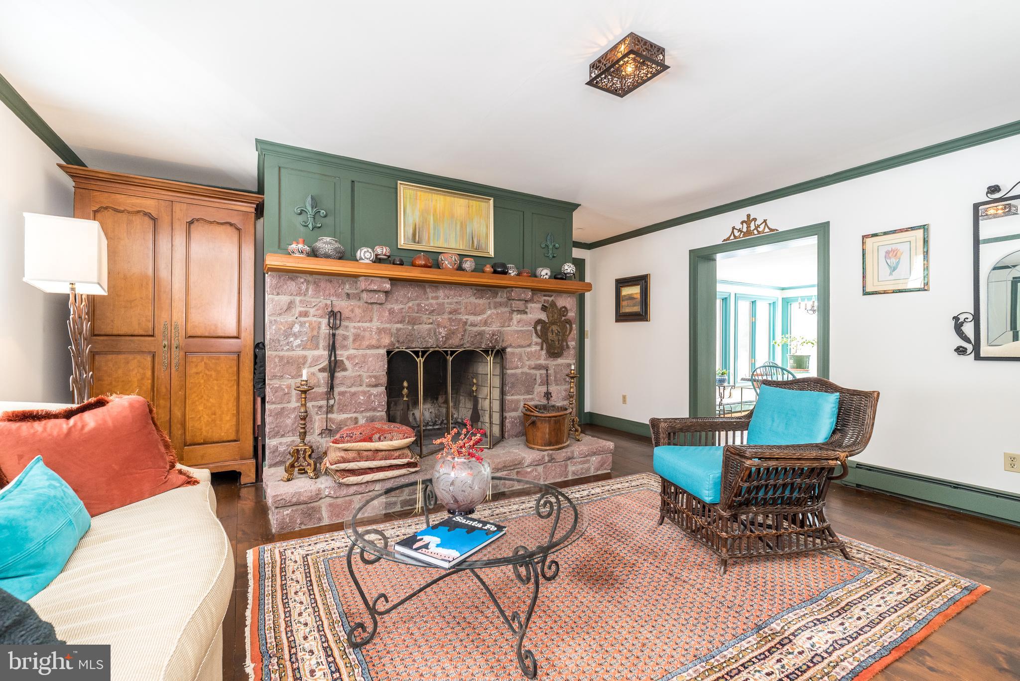 23 Lily Valley Road Erwinna, PA 18920 - Photo 38 of 81 a living room with furniture and a fireplace