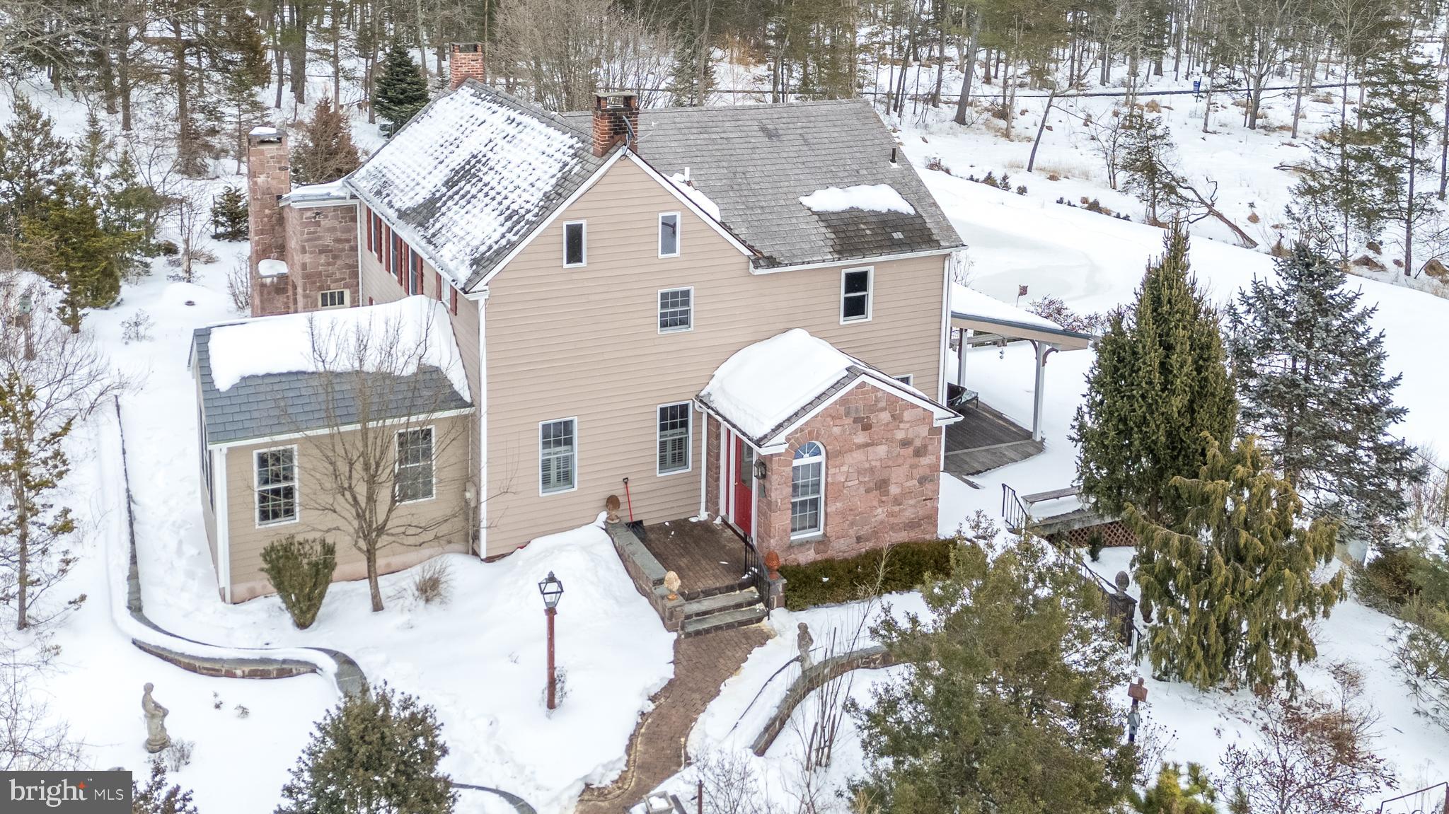 23 Lily Valley Road Erwinna, PA 18920 - Photo 4 of 81 a view of a house with a outdoor space