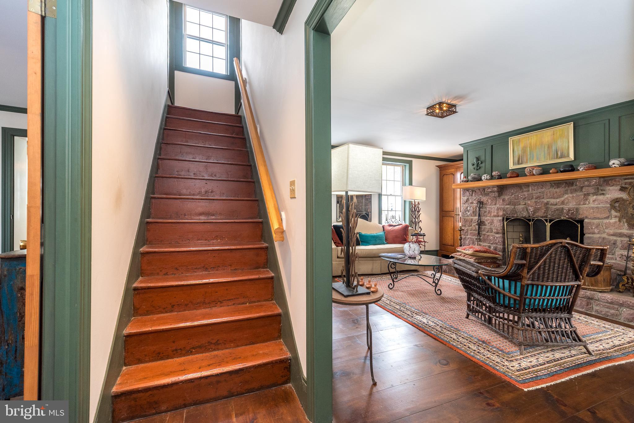 23 Lily Valley Road Erwinna, PA 18920 - Photo 57 of 81 a living room with furniture and a fireplace