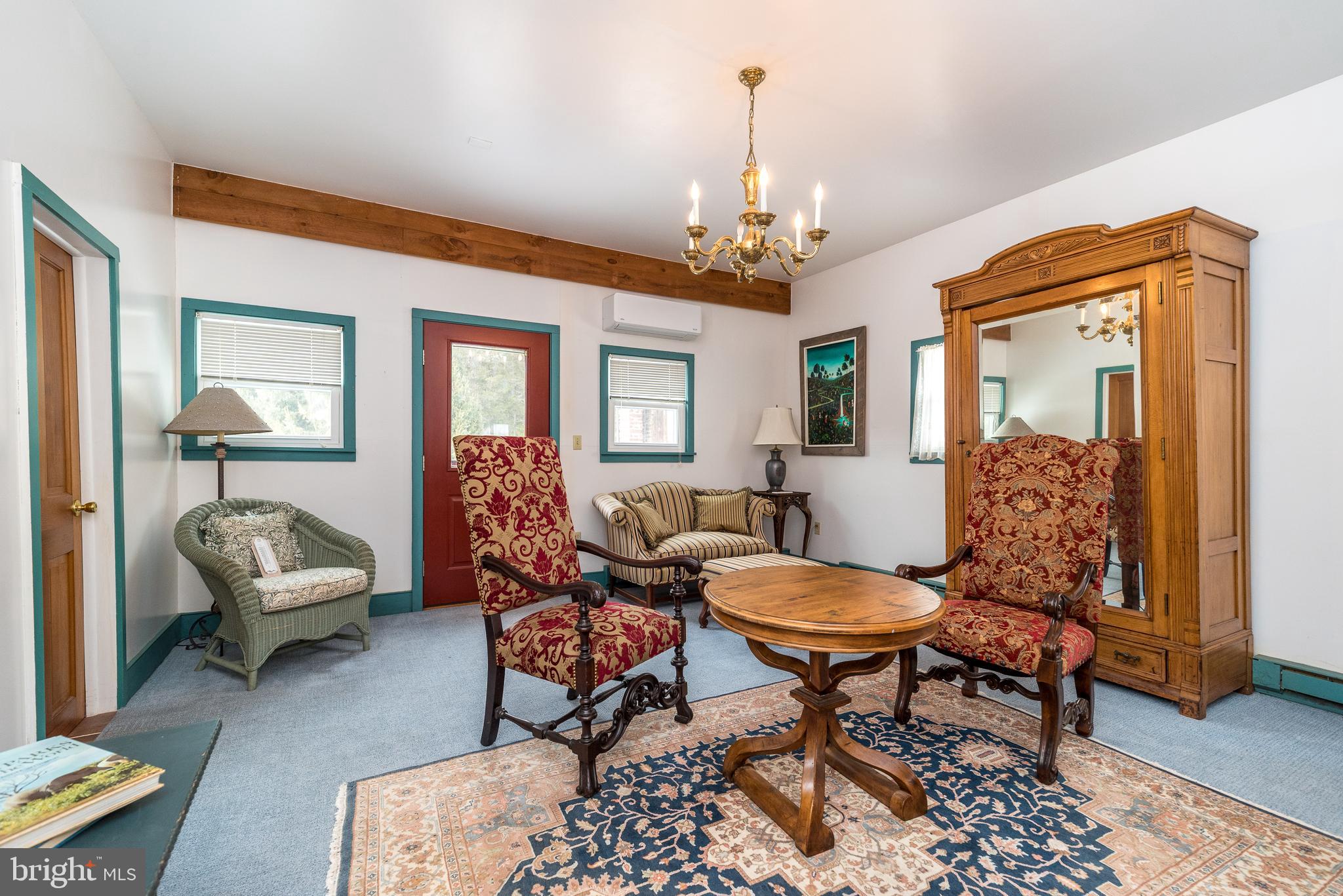 23 Lily Valley Road Erwinna, PA 18920 - Photo 68 of 81 a view of a livingroom with furniture and a chandelier