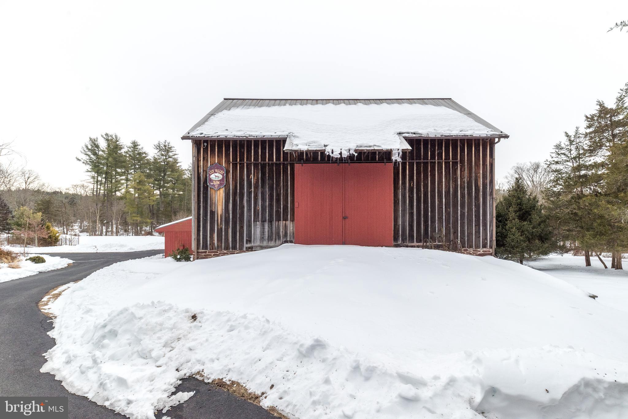 23 Lily Valley Road Erwinna, PA 18920 - Photo 73 of 81 a view of a house with a snow in the yard
