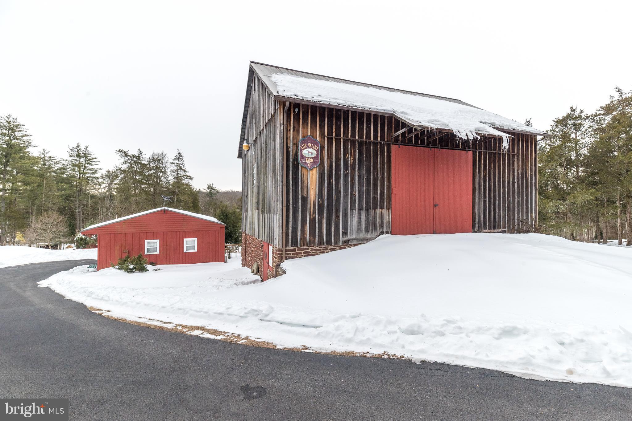 23 Lily Valley Road Erwinna, PA 18920 - Photo 74 of 81 a view of a house with a snow in the yard