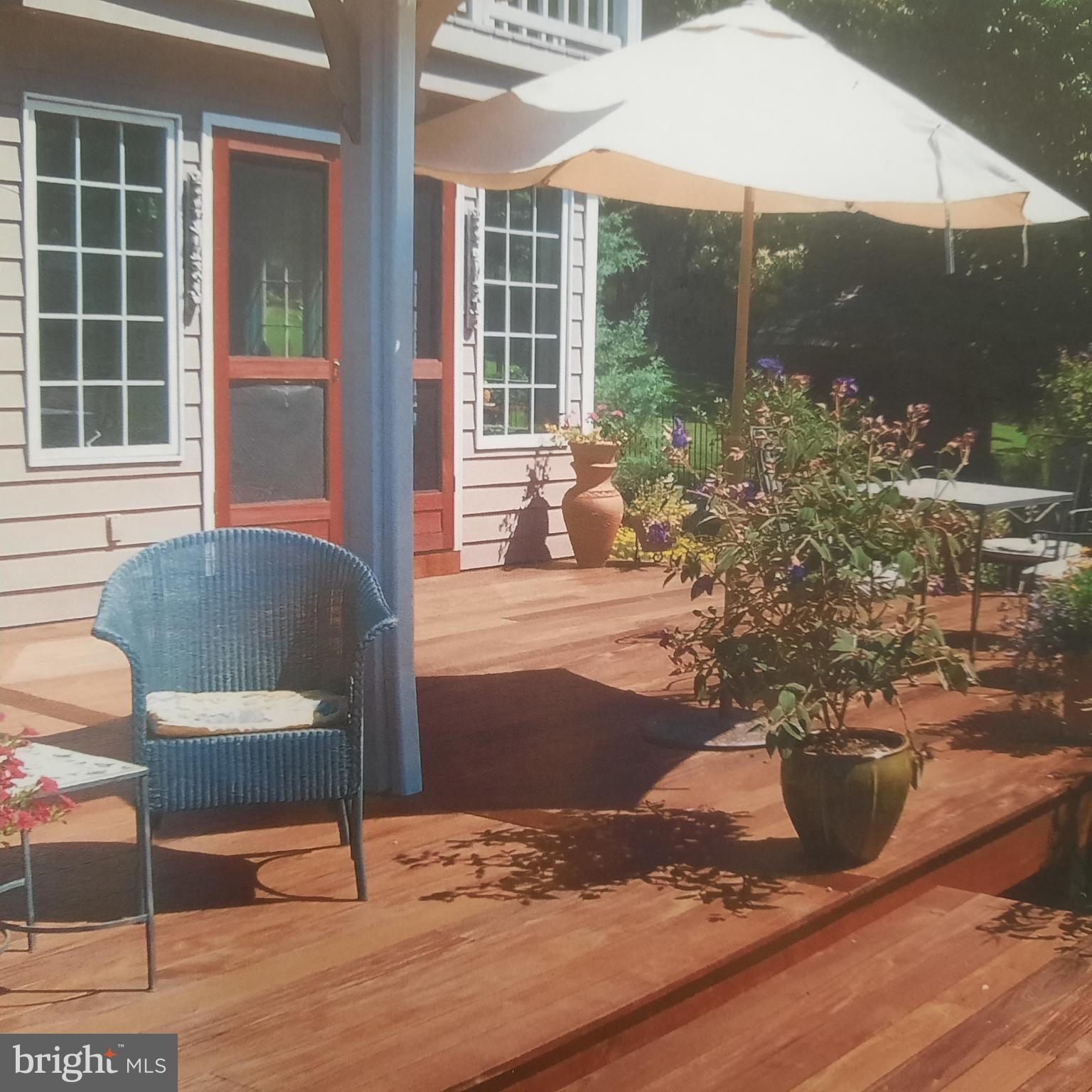 23 Lily Valley Road Erwinna, PA 18920 - Photo 79 of 81 a view of a balcony with chair and table