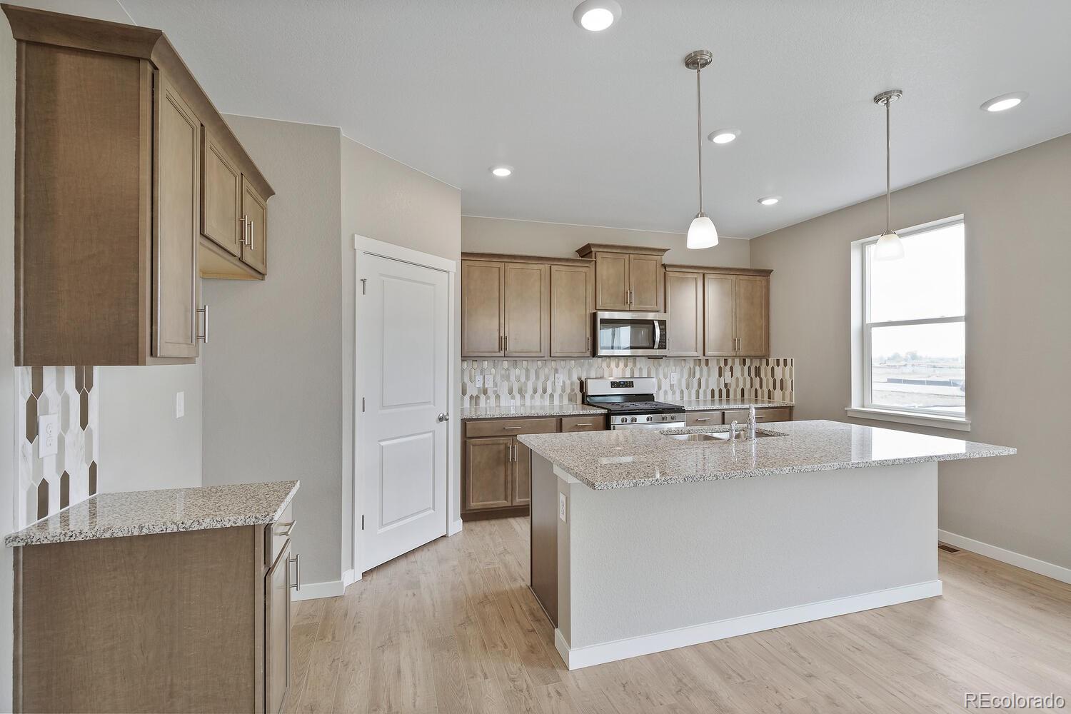 279 Swallow Road Johnstown, CO 80534 - Photo 5 of 27 Gallery Image 5
