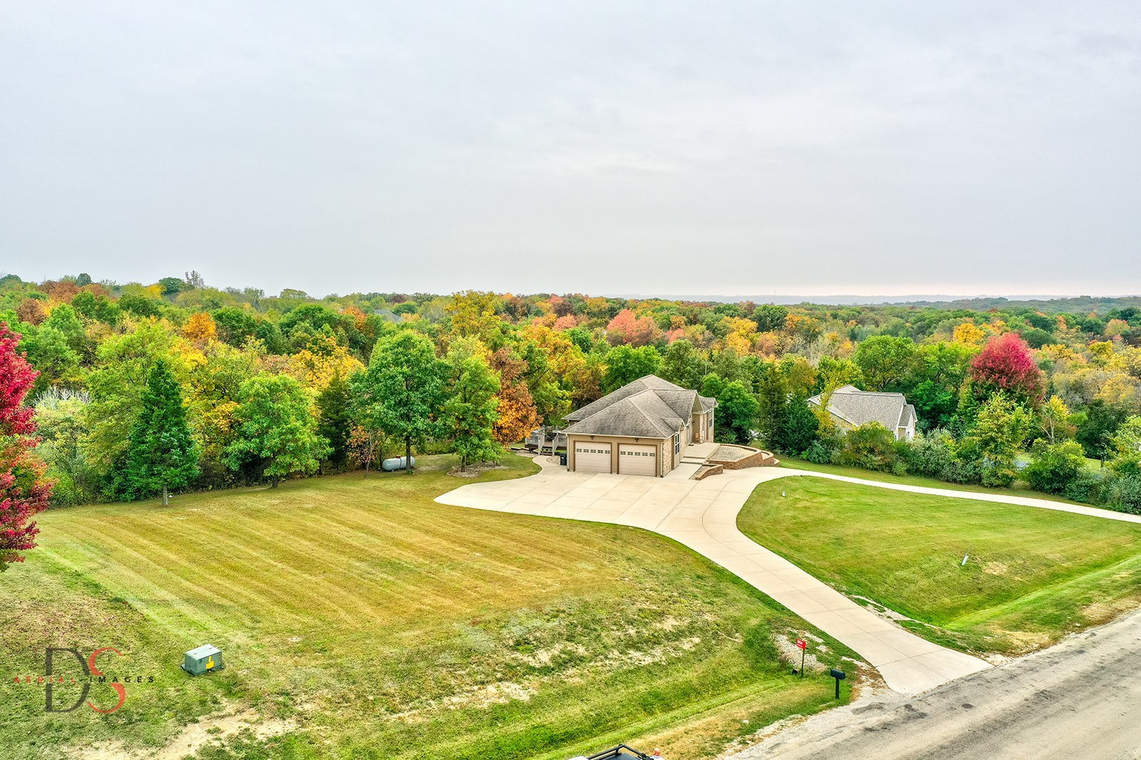 a view of a swimming pool with a yard