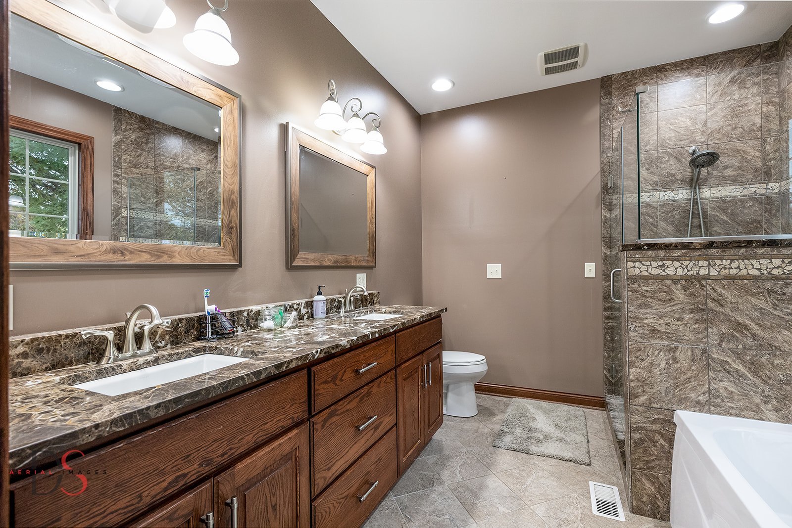 2834 East 2525th Road Marseilles, IL 61341 - Photo 21 of 31 a bathroom with a double vanity sink and a mirror