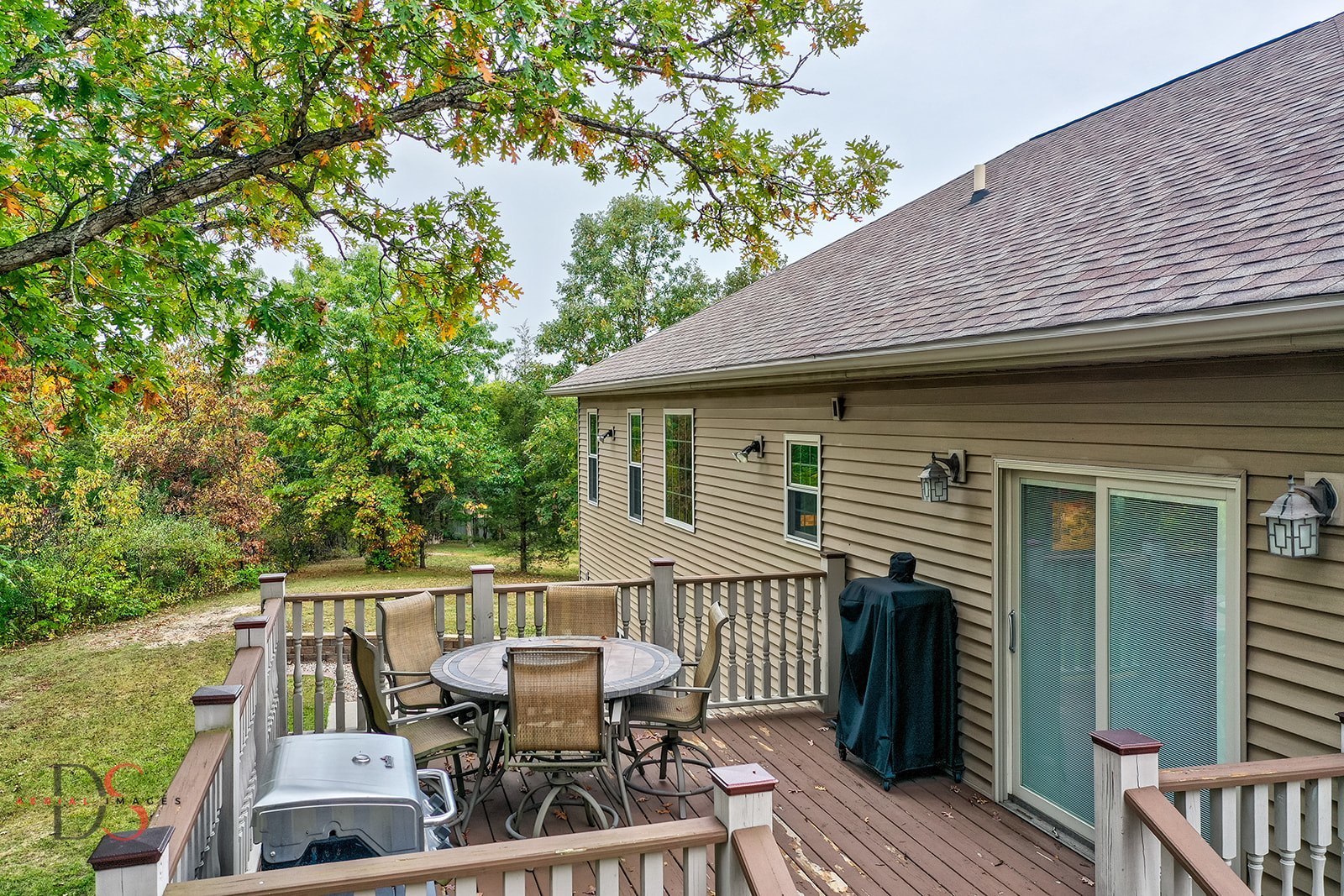 2834 East 2525th Road Marseilles, IL 61341 - Photo 8 of 31 a roof deck with table and chairs and wooden floor