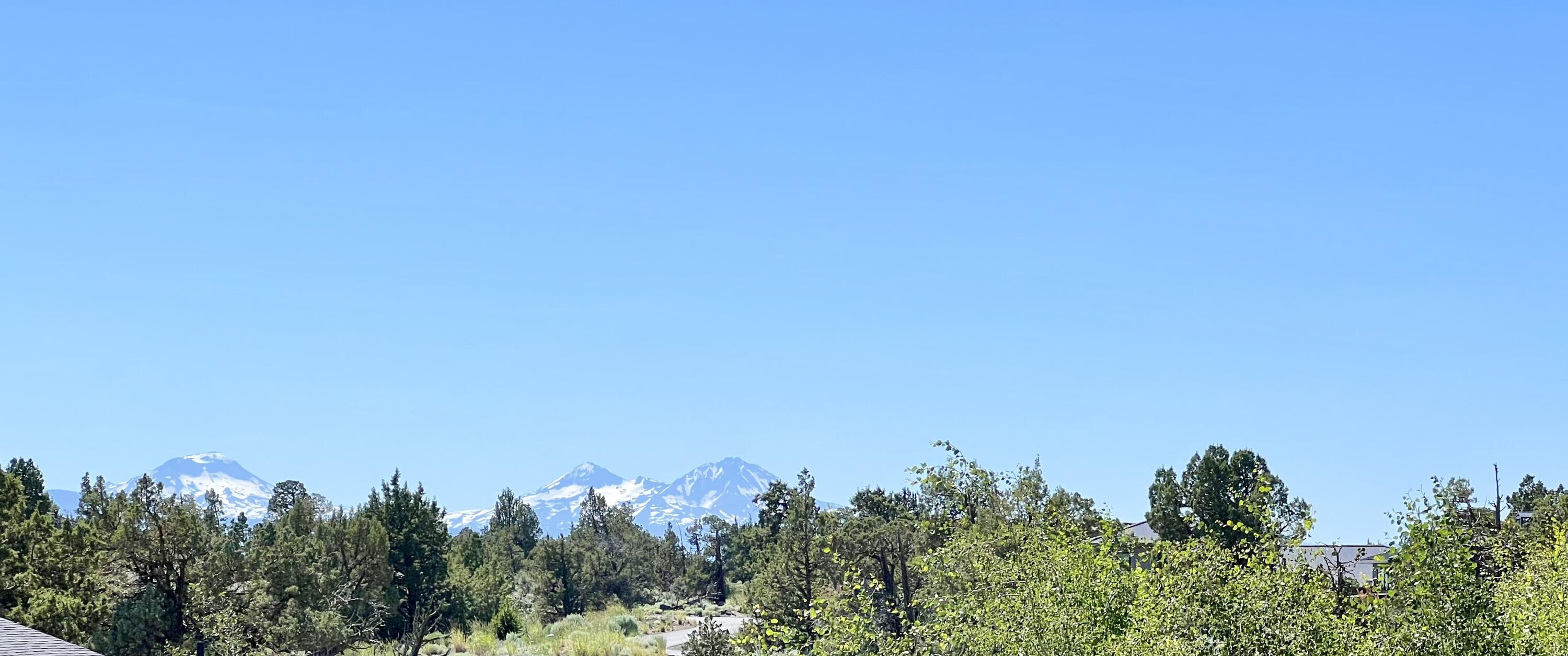 22957 Ghost Tree Lane, Unit 333 Bend, OR 97701 - Photo 3 of 21 Early Summer mtn views from back part of property