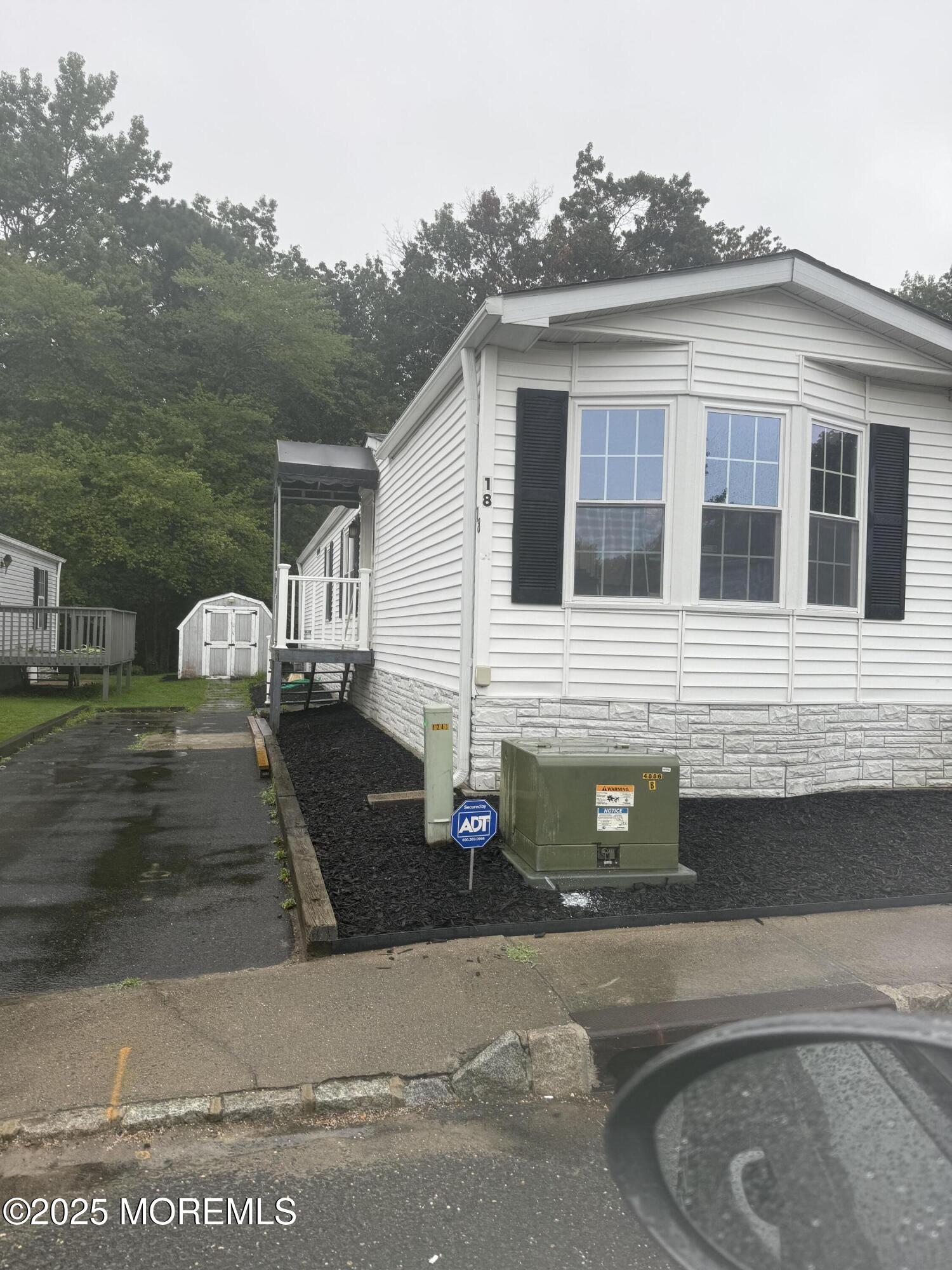 18 Ruffian Way Howell, NJ 07731 - Photo 1 of 9 a front view of a house with a yard
