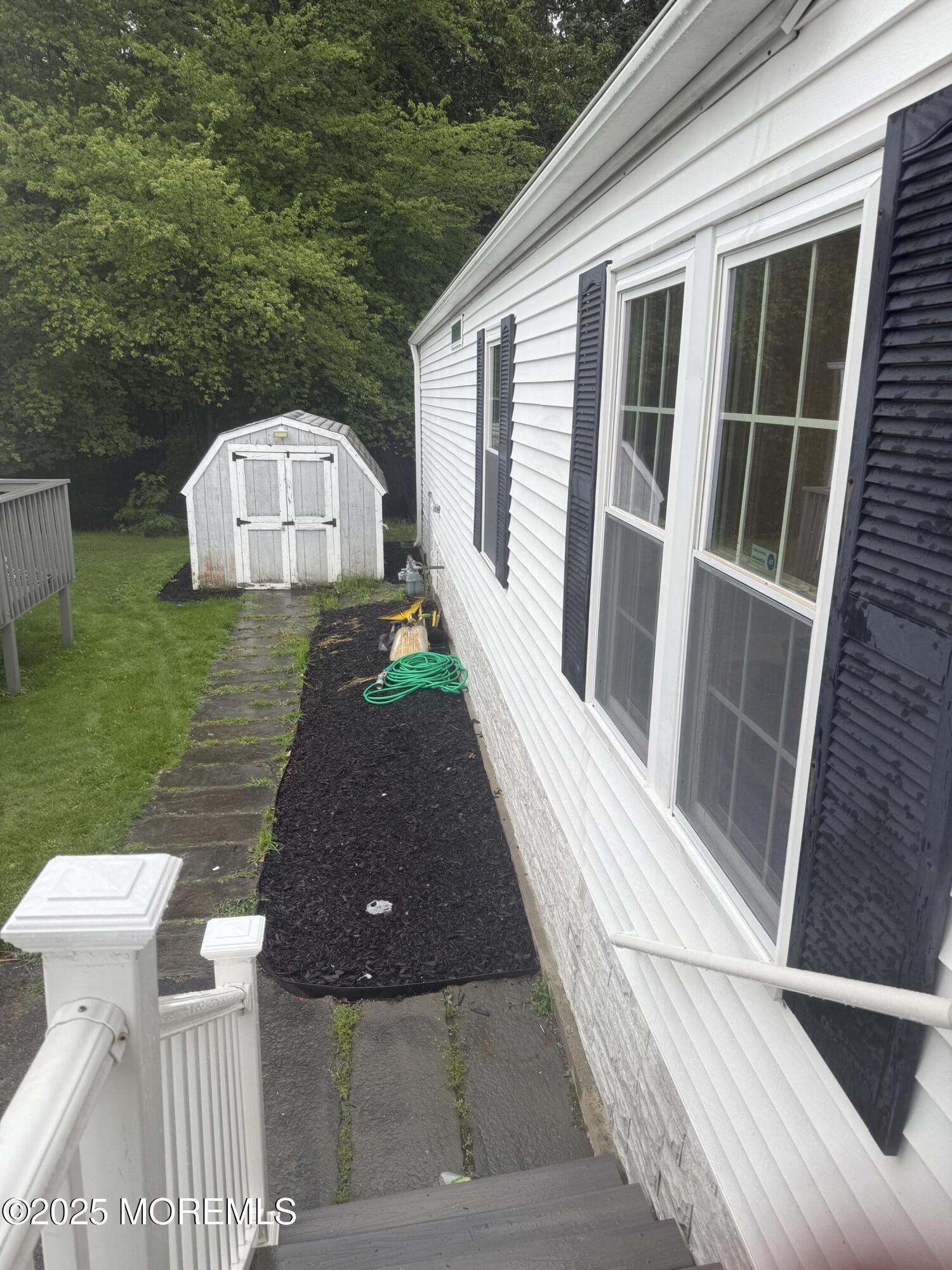 18 Ruffian Way Howell, NJ 07731 - Photo 2 of 9 a view of a back yard of the house