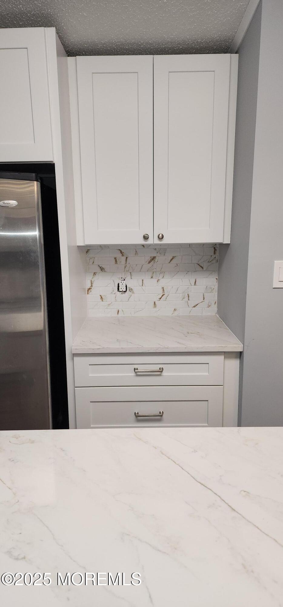18 Ruffian Way Howell, NJ 07731 - Photo 8 of 9 a view of kitchen with white cabinets